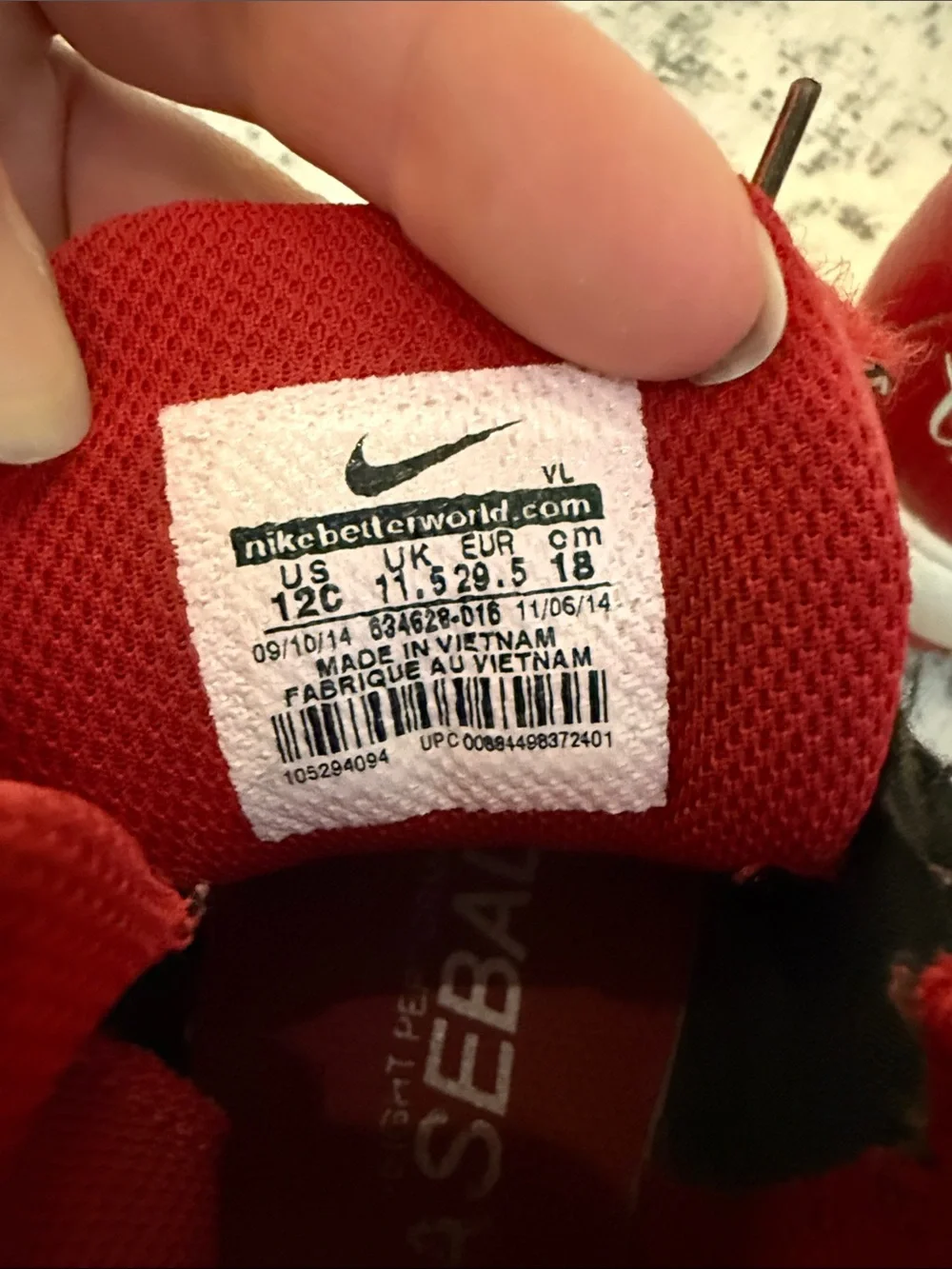 Nike Kids Red and Black High-Top baseball shoes